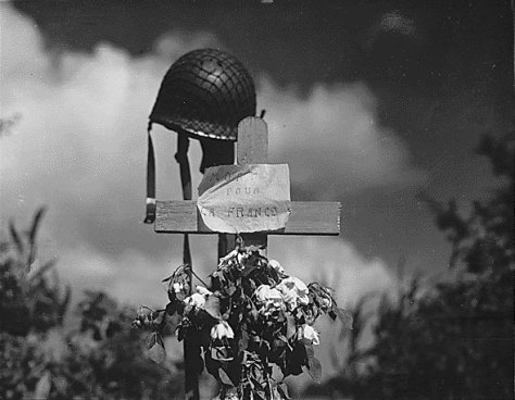 French civilians erected this silent tribute to an American solider who has fallen in the crusade to liberate France. Carentan, France., 06/17/1944